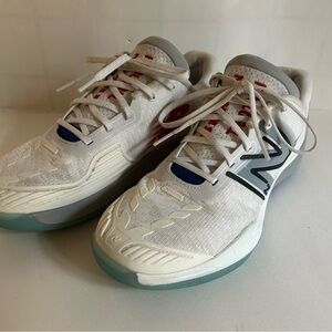 New Balance 996v5 Court Sneakers in White, blue, teal, and red.